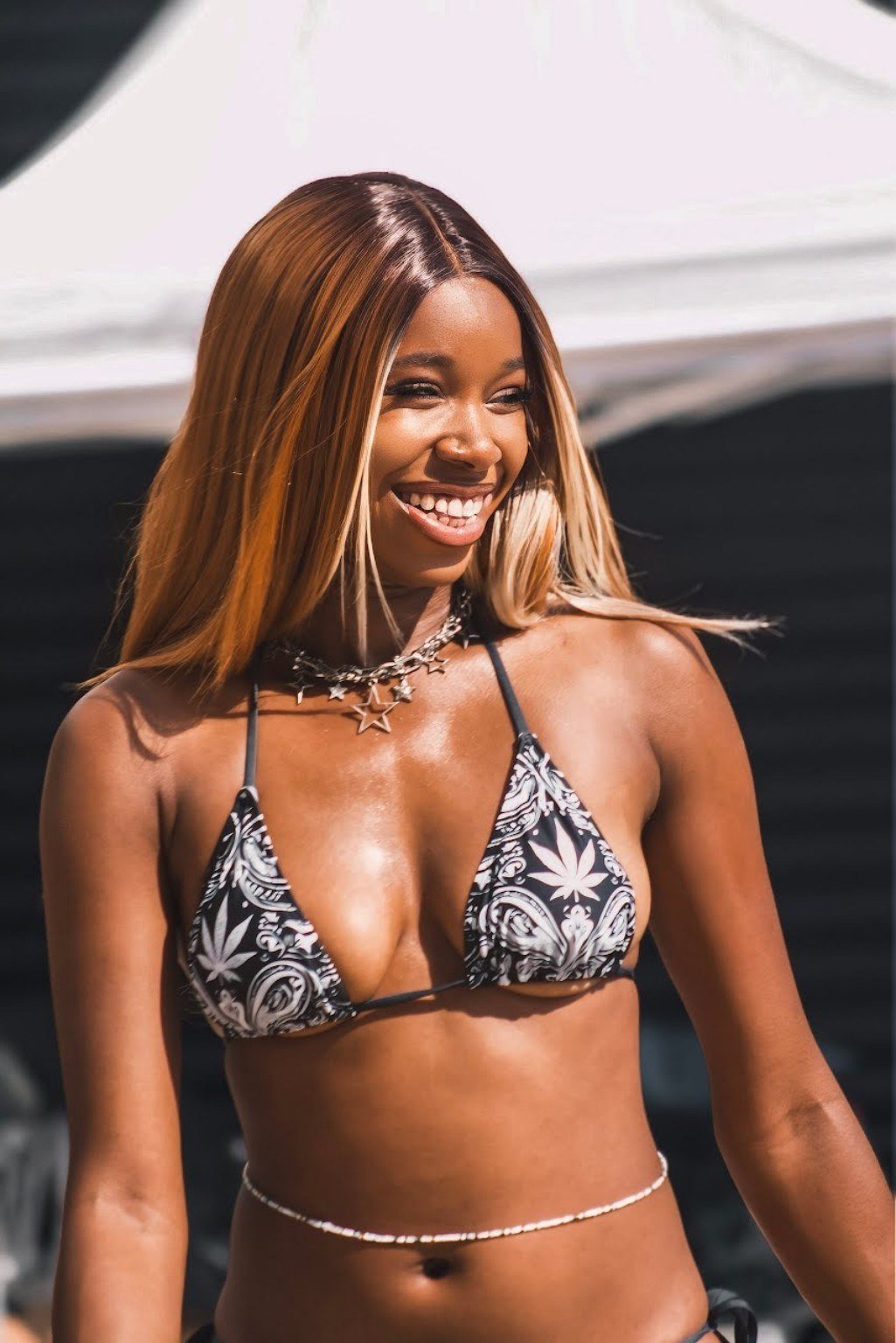 QUILA model in black and white bikini